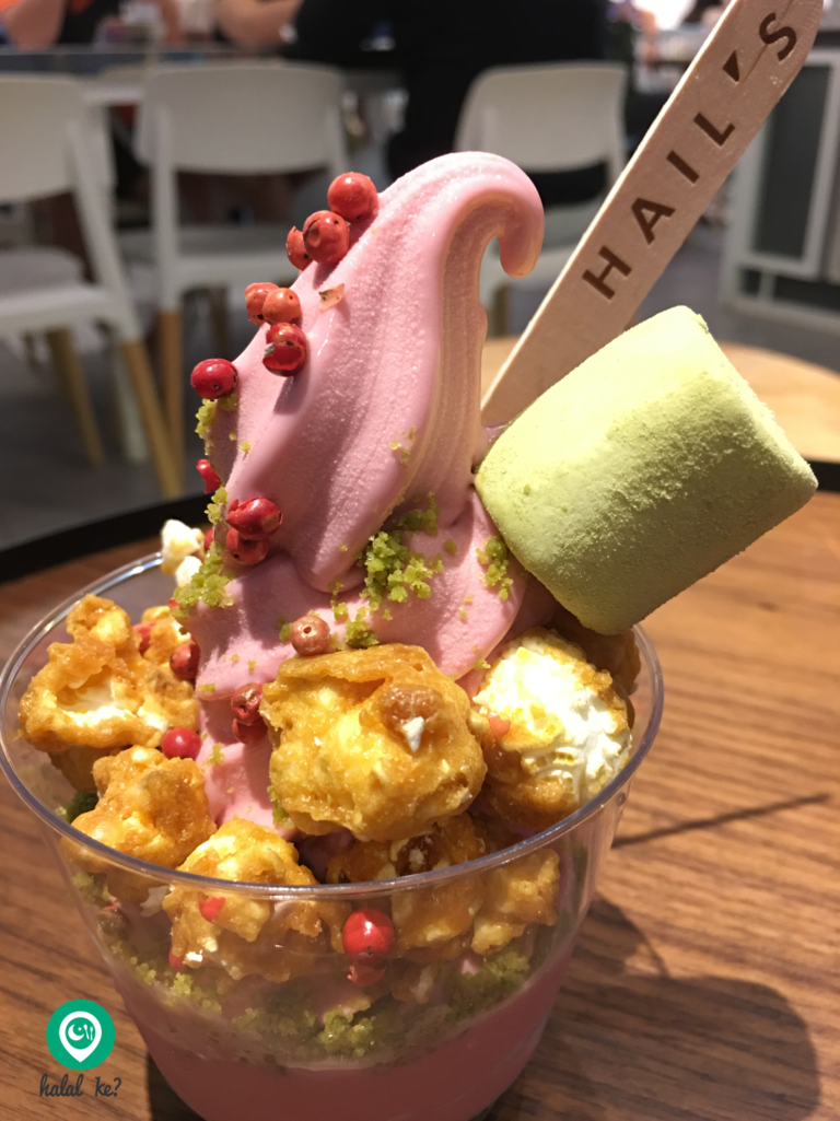 Hail's Berry Pom Pom soft serve topped with popcorns and pink peppercorn seeds makes a splash of colour and flavour in a mouthful.